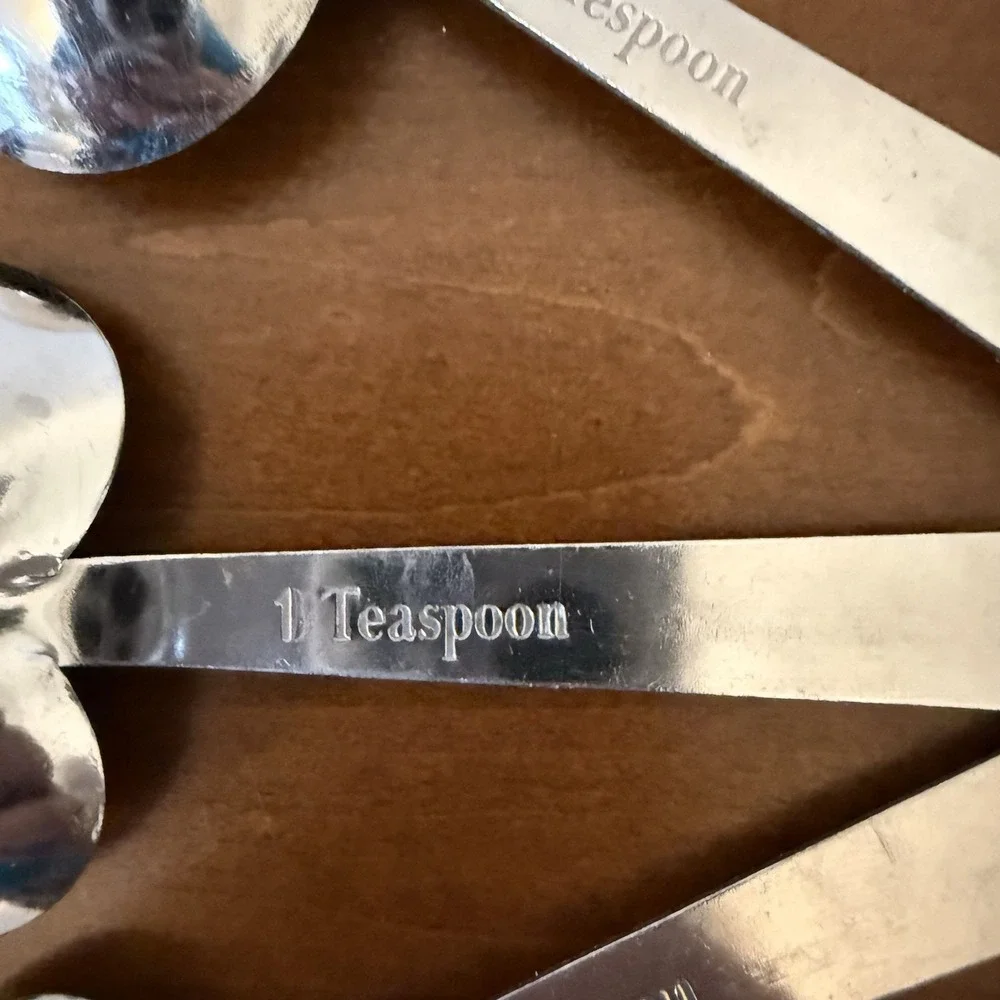 Set of 4 Stainless Steel Heart Shaped Measuring Spoons with Phrases
